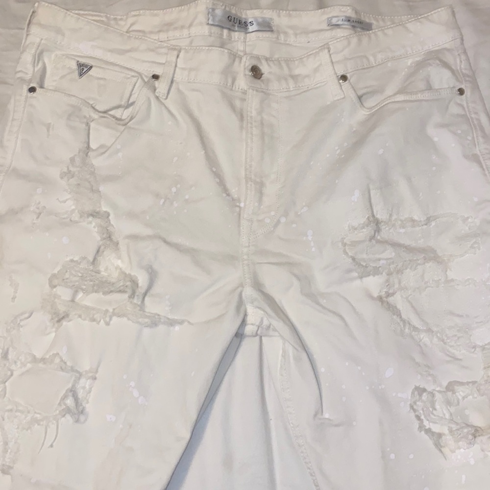 Guess slim shorts, back right pocket has a stain.